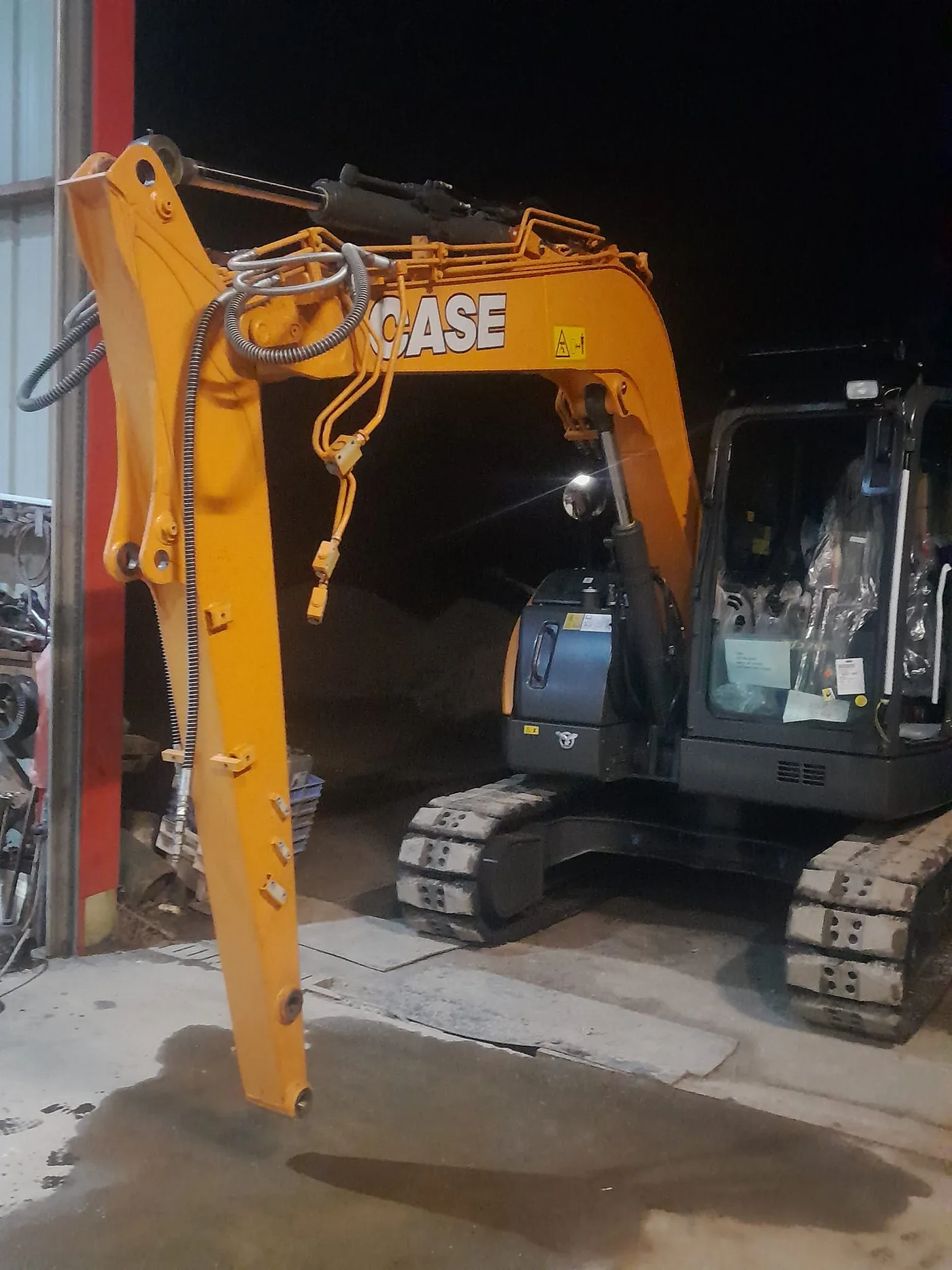 Modification de bras de pelle Case par FarmForst Industrie